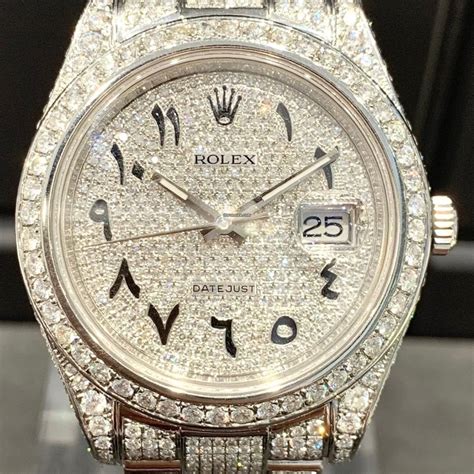 iced out rolex arabic dial.